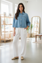 Statement denim cape jacket with flowy silhouette, button-up front, and lightweight cotton construction