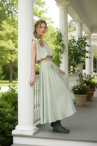 Sage green set on porch - leaning against column
