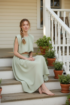 Sage green set on porch - sitting on steps