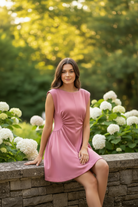Seated outdoor pose - cinched waist dress