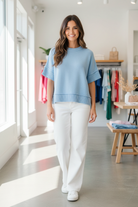 blue drop shoulder sweater top front view boutique brunette