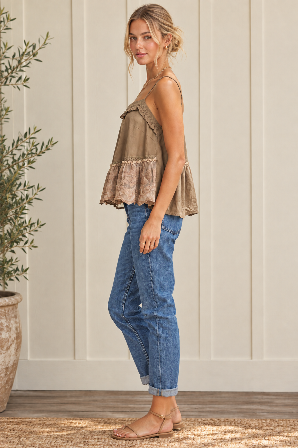 Side view of mocha floral lace cotton flare cami styled with neutral strappy sandals