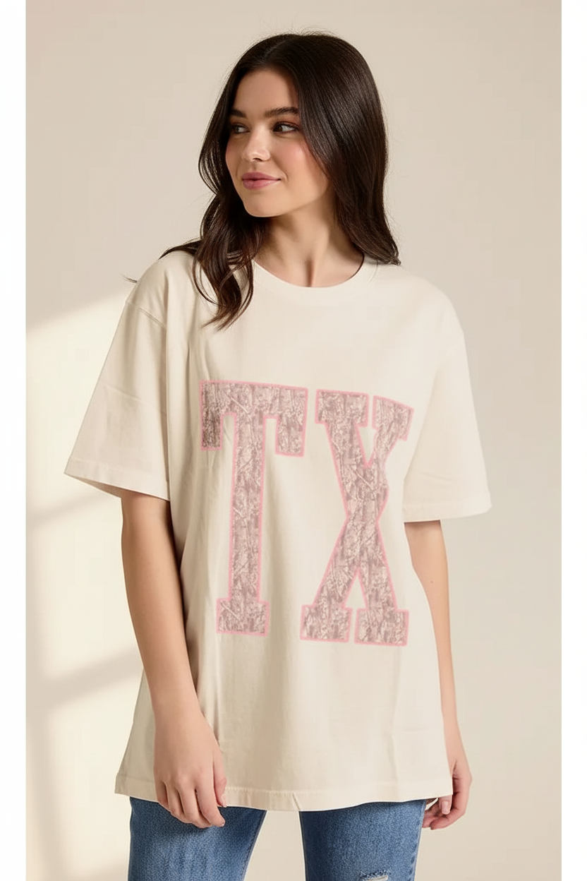Thread Bar Boutique TX graphic oversized boyfriend tee by Zutter featuring pink lace puff print lettering on vintage cream mineral wash cotton.