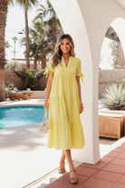 Casual gingham midi dress with short sleeves and breezy tiered silhouette