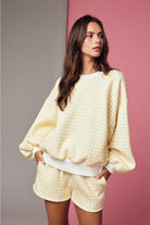 Yellow and white gingham cozy chic women’s lounge set featuring a plush crewneck sweatshirt and drawstring shorts with pockets butter yellow